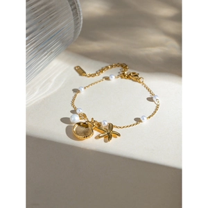 18k gold plated stainless steel pearl bracelet with starfish and seashell charms