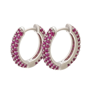 Detailed close-up of silver hoop earrings with triple row micro-set pink gemstones