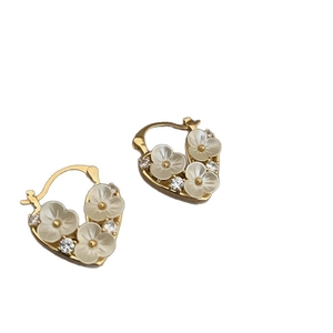 18k gold plated heart hoop earrings featuring white pearlescent flowers and cubic zirconia