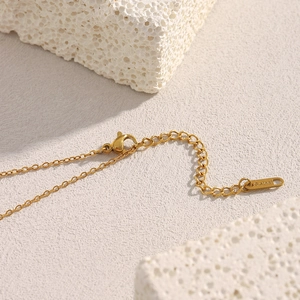 Detail of 18K gold plated stainless steel chain with lobster clasp and S.steel hallmark