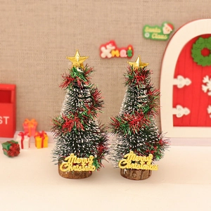 Set of 2 mini green and white frosted cedar Christmas trees with gold star and merry christmas logo