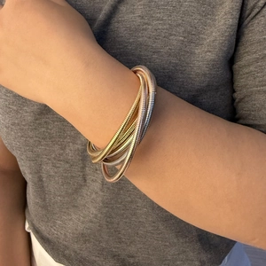 Three-color flexible snake chain bangles in gold, silver, and rose gold layered style