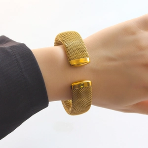 Elegant gold mesh stainless steel open cuff bracelet featuring a woven texture for women