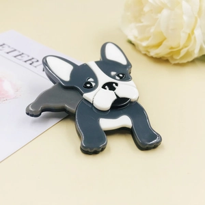 Cute acrylic French Bulldog brooch with grey and white polished finish on a minimalist background
