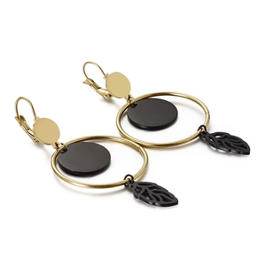 Minimalist titanium steel earrings featuring black circular discs and gold hollow leaf drops