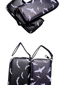 Detail of vintage bat and spider web pattern on black faux leather long zip wallets