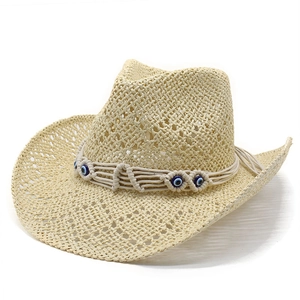 Handmade hollow straw cowboy hat with evil eye bead band and wide curved brim
