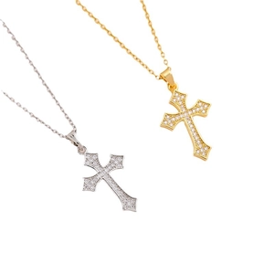 Sparkling cross pendant necklaces in gold and silver with micro-pave zircon crystals