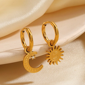 Asymmetric sun and moon gold drop earrings with sparkling zircon and etched patterns