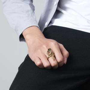 Retro king cobra snake ring in golden stainless steel worn on a finger for men
