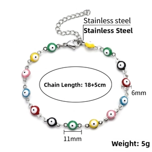 Detail of colorful Evil Eye beads on a 18+5cm stainless steel bracelet with lobster clasp