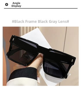 Detail of oversized black square sunglasses with dark grey lenses and silver rivets