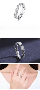 Detailed view of S925 sterling silver geometric band ring with sparkling cubic zirconia