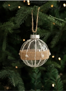 Close-up of 8cm clear Christmas ball with burlap ribbon, pearls and rustic twine