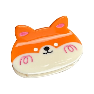 Cute orange acetate corgi dog hair claw clip with a sleek cream finish and sharp details