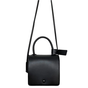 Minimalist black square crossbody bag with smooth leather finish and stylish top handle
