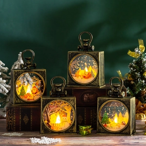 Macro detail of retro bronze Christmas lantern with LED light and festive holiday scenes