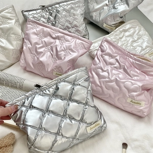 Quilted heart and diamond pattern PU makeup bags in silver, pink and beige tones