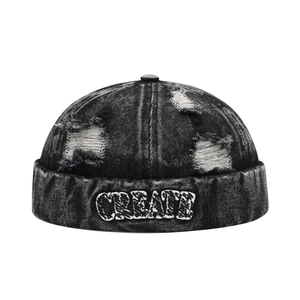 Retro washed black denim docker cap with CREATE embroidery and distressed ripped details