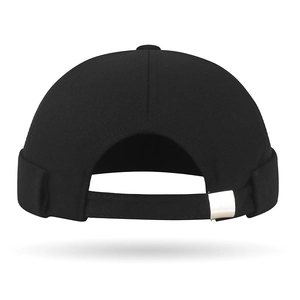 Retro black cotton docker hat with adjustable metal buckle back view on white background