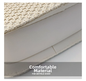 Macro shot of stylish woven texture and smooth beige leather stitching on square bag