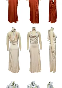 Détail d'une robe en satin avec dos nu, lien à la taille et fente latérale en plusieurs coloris