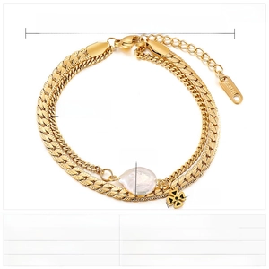 Double-layer gold stainless steel bracelet featuring shell pearl and flower charm details