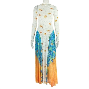 Detail of goldfish print long-sleeve mesh dress with vibrant orange and blue dye hem