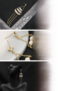 Detail of long tassel earrings with natural freshwater pearls and 18K gold plating