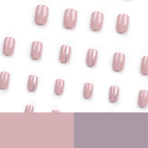 Glossy mauve pink press-on nails with silver glitter stripe accents on white background