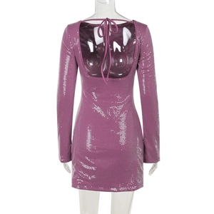 Detail of purple sequin mini dress featuring an open back design with tie-up straps