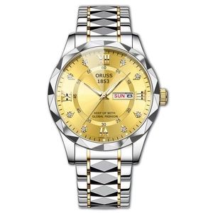 Detailed macro view of gold sunray dial with double calendar and diamond indices
