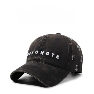 Macro view of detailed 3D letter embroidery on washed distressed baseball cap fabric