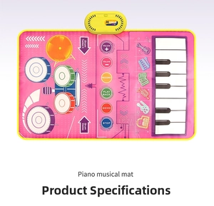 Detail showing the sound control box and colorful instrument keys on the pink music mat