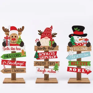 Three-piece Christmas wooden sign set featuring reindeer, gnome, and snowman figures