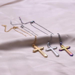 Polished stainless steel cross necklaces in gold, silver, and iridescent 18k plating