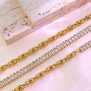 18K gold plated titanium jewelry set with zircon rectangles on beige stone