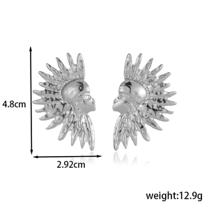 Silver stainless steel sun goddess earrings with abstract bohemian tassel design