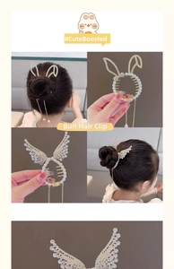 Détail d'une pince à cheveux en perles avec strass et chaîne à pompons en métal