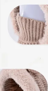 Detailed view of thick knit khaki winter hat with soft fleece lining and ribbed neck protector
