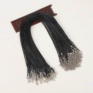 Detail of black wax cord necklace chains with silver lobster clasps and extension links