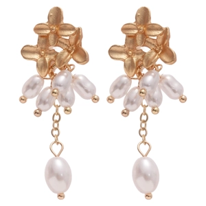 Elegant gold flower earrings with pearl tassels and silver needles in a vintage style