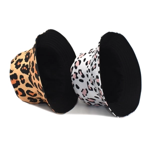 Fashionable leopard print bucket hats in classic yellow and modern white canvas styles