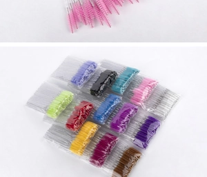 Bulk set of disposable colorful mascara wands with glitter handles in clear packaging