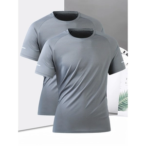 Detailed view of two men's grey quick-dry athletic t-shirts with breathable fabric texture