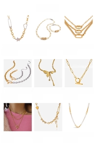 Detailed grid of 18K gold plated stainless steel paperclip necklaces and butterfly jewelry