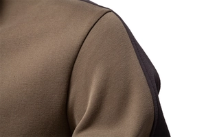Detailed close-up of the two-tone shoulder stitching on high-density knit sweatshirt