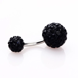 Close-up of a silver belly button ring with double black disco balls encrusted with crystals