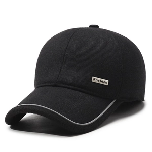 Classic black baseball cap with fashion metal badge and premium textured fabric finish