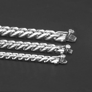 Detailed comparison of three different widths of silver Cuban link chains with secure buckles